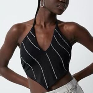 Tie up, open back shirt. Size small. Motel brand